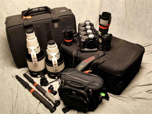 alt="Professional photography gear collection"